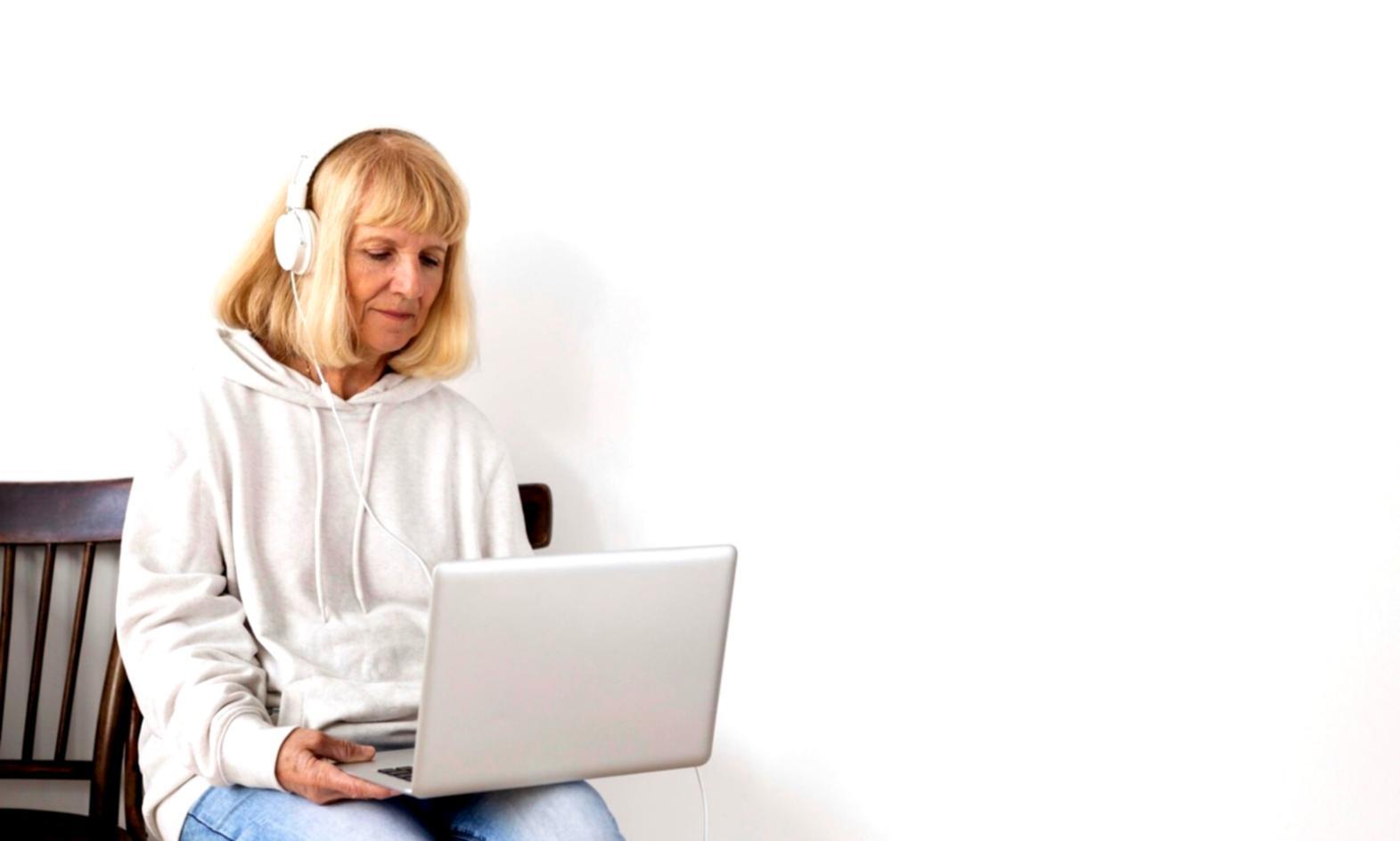 Person reviewing financial documents and planning budget goals